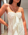 Abito lungo in tulle con volant