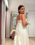 Abito lungo in tulle con volant