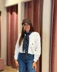 Cappello in ecopelle con visiera
